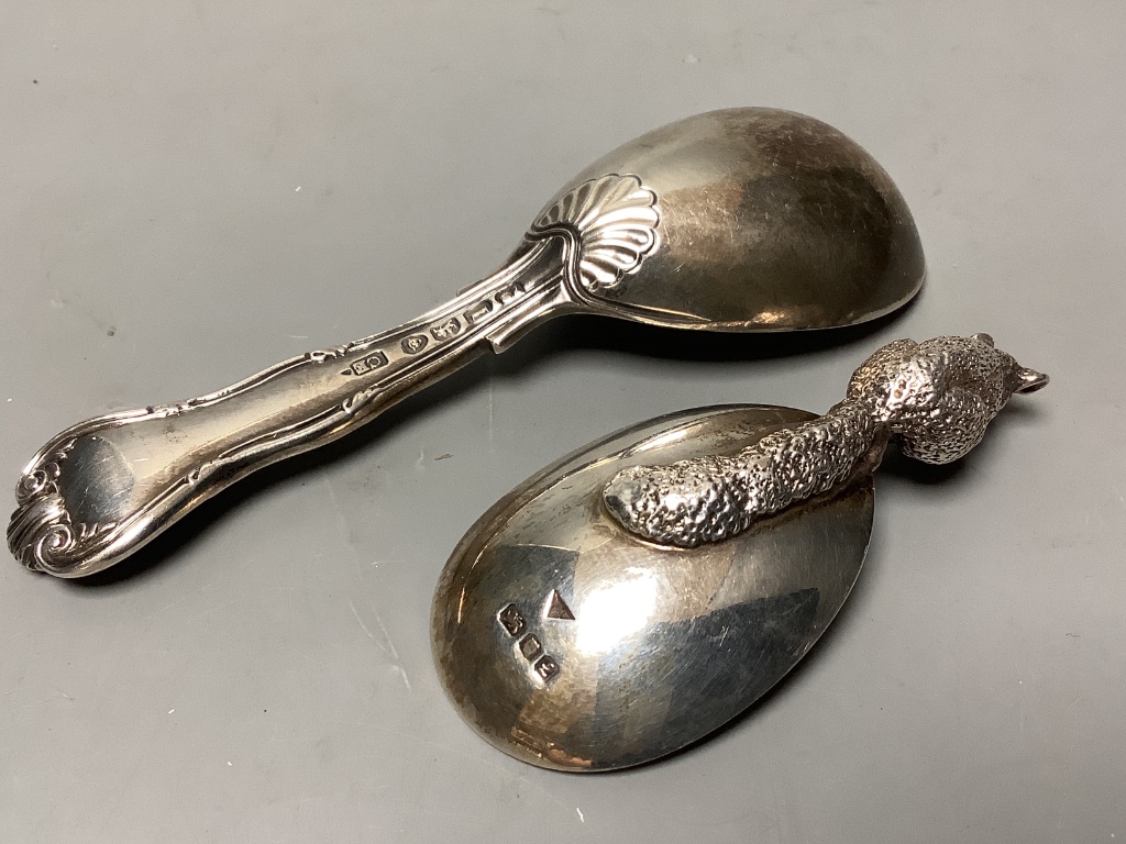 A modern silver caddy spoon, with squirrel handle, by Brian Leslie Fuller, London, 1985, 65mm and a George IV silver caddy spoon, London, 1825.